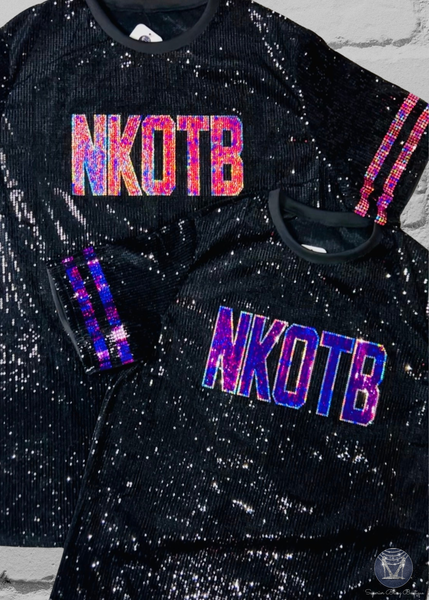 Black Sequin Dresses with custom text on the front. One uses light pink and silver bling and the other uses purple and silver bling. One dress has light pink sleeve stripes and the other has purple.