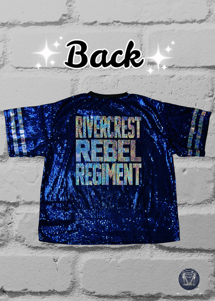 A blue sequined v-neck jersey back view featuring 'RIVERCREST REBEL REGIMENT' in silver holographic spangles with silver sleeve stripes.